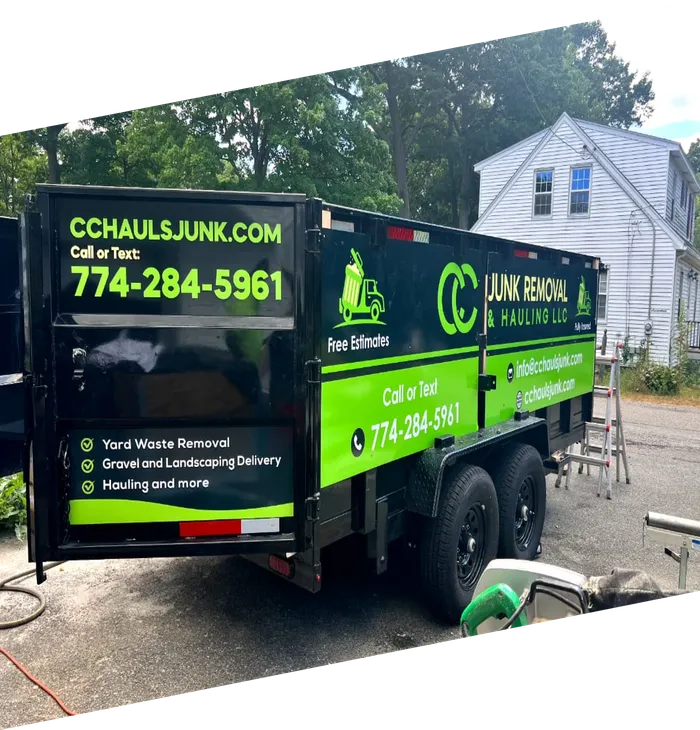 A truck and trailer belonging to "CC Junk Removal & Hauling LLC"